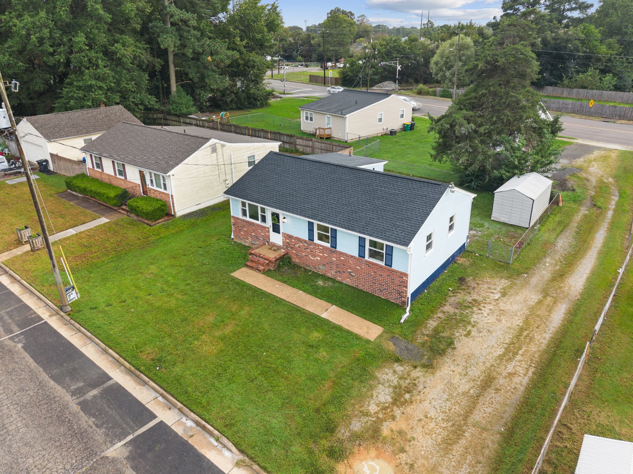 Aerial view of the finished house and its backyard