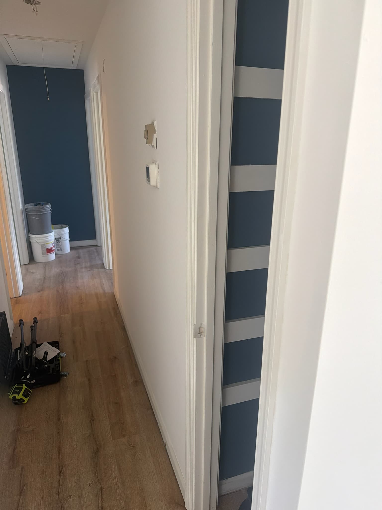 New floors and a navy accent wall