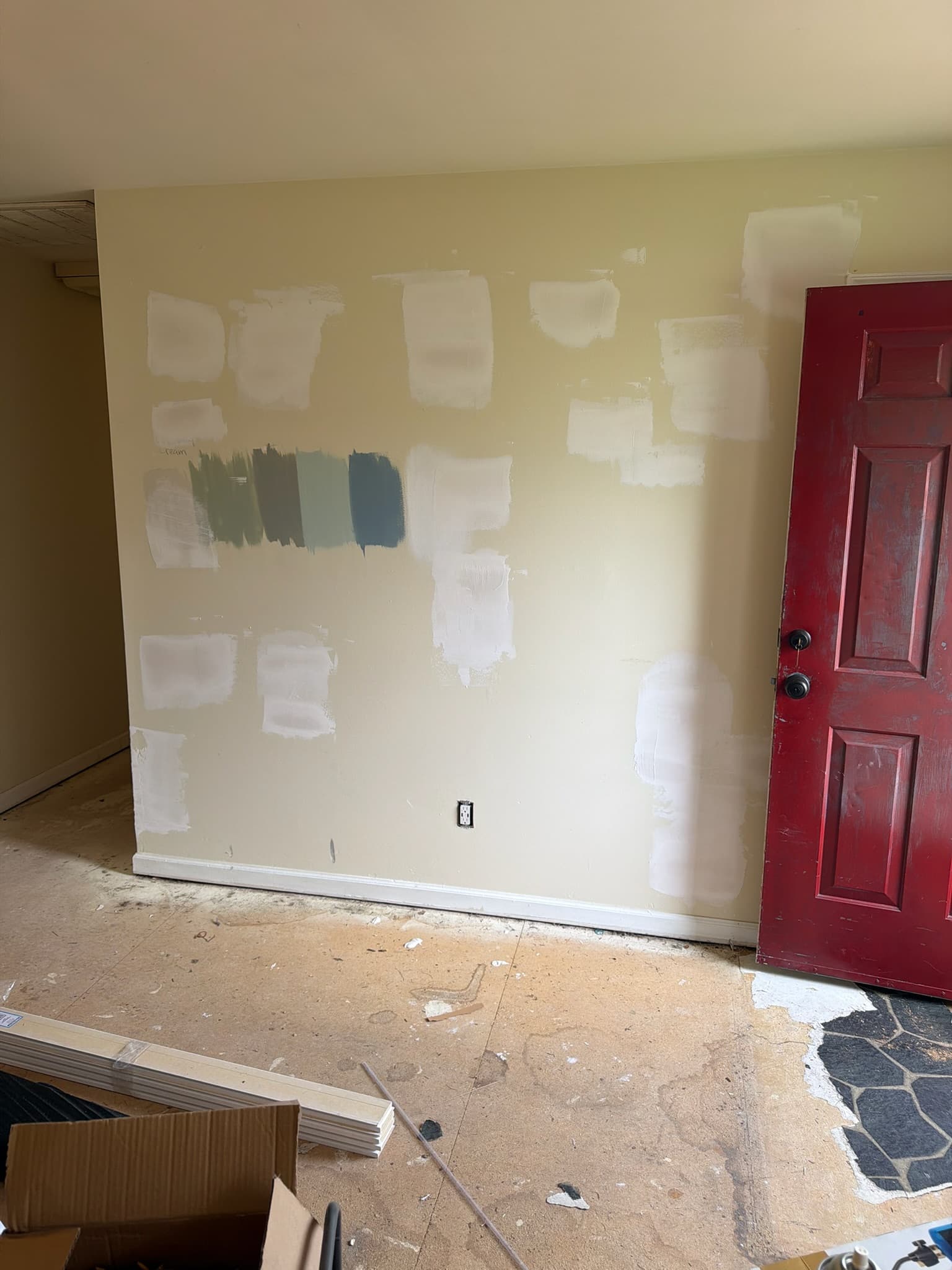 Testing paint colors on fresh drywall patches
